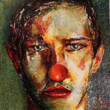 Portrait de jeune homme en clown  triste au nez rouge.